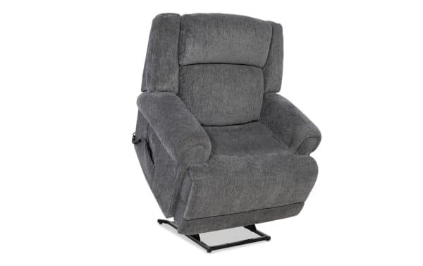 Gray fabric upholstered power lift recliner chair with padded armrests and backrest, designed for comfort and mobility assistance.