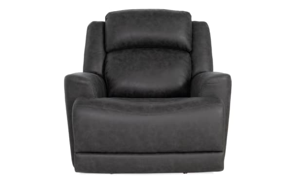 Dark gray leather recliner chair with padded armrests and cushioned backrest, designed for comfort and modern living room decor.