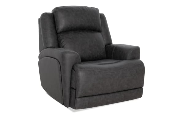 Dark gray leather recliner chair with padded armrests and cushioned backrest, designed for comfort and modern living rooms.