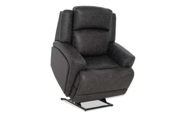 Dark gray leather power lift recliner chair with padded armrests and cushioned backrest, designed for comfort and ease of use.