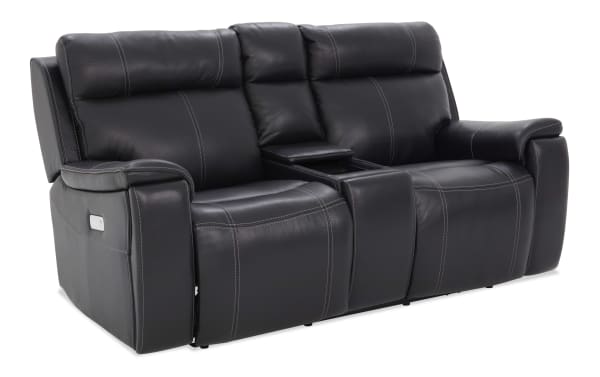 Black leather reclining loveseat with contrast stitching, padded armrests, and center console with storage, ideal for home theater seating.