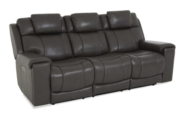 Dark brown leather reclining sofa with three seats, padded armrests, and adjustable headrests, designed for living room comfort.