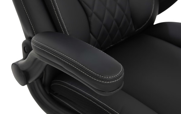 Black leather office chair armrest with white stitching, featuring padded cushioning and ergonomic design for comfort and support.