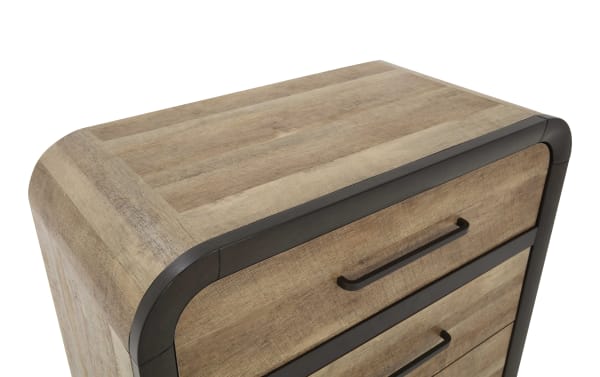 Wooden dresser corner with rounded edges and black metal trim, featuring a natural light brown finish and black handles on drawers.
