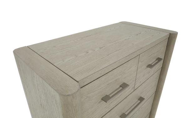 Light wood dresser with rounded edges and metal handles, featuring a smooth grain texture and modern, minimalist design.
