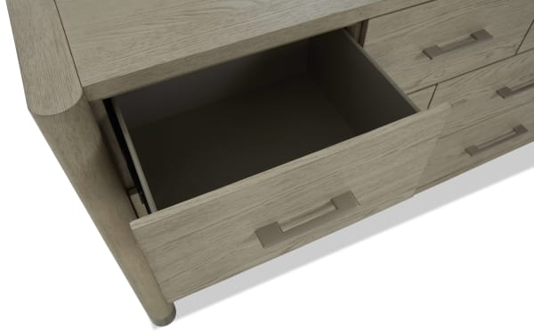 Contemporary Catalina Light Gray 7 Drawer Dresser with smooth sliding, soft-close drawers in MDF, rubberwood, and oak veneers, featuring a felt-lined top drawer.