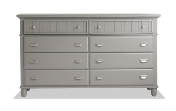 Spencer Gray 8 Drawer Dresser in transitional style with hardwood solids, MDF, plywood, and poplar. Features eight spacious drawers with mixed knob and pull handles in a soft gray finish.