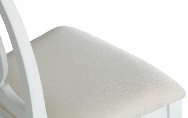 White Madelyn Desk Chair seat with diamond-patterned fabric upholstery, featuring a glam style youth vanity chair made from pine and poplar solids.