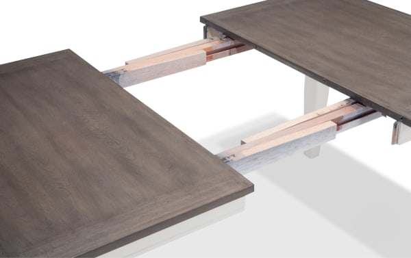 Blake White & Gray Extendable Dining Table from Blake collection, cottage style with MDF, birch, mango, rubberwood veneers, and hardwood solids. Shows table extended with 18" leaf, expanding length from 48" to 66".