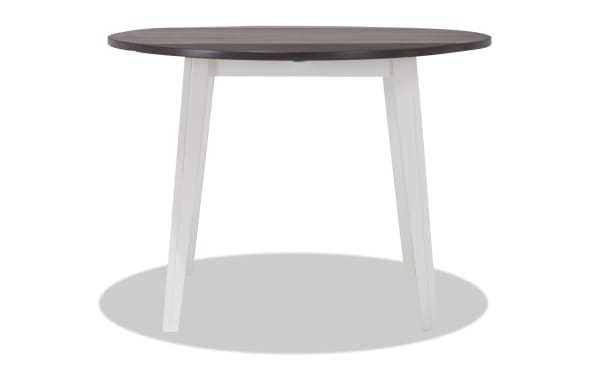 Blake White & Gray Round Drop Leaf Dining Table from Blake collection, cottage style with white tapered legs, gray MDF and birch veneer top, compact for small spaces.