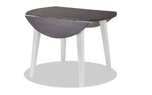 Blake White & Gray Round Drop Leaf Dining Table from Blake collection, cottage style with white legs and gray wood top, made of MDF, birch, mango, and rubberwood veneers.