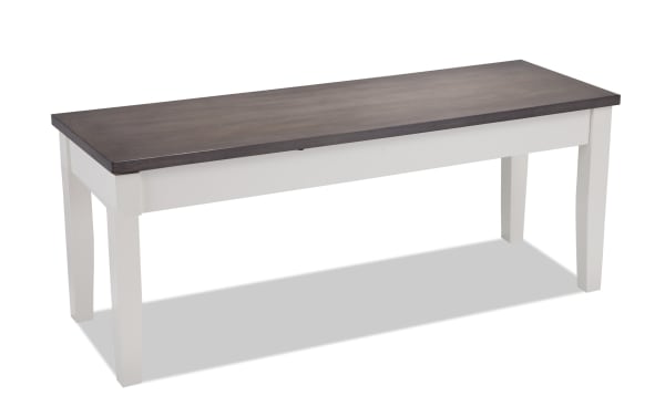 Blake White & Gray Storage Dining Bench from Blake collection, cottage style with a gray wood top and white painted hardwood legs, featuring hidden storage and solid MDF, birch, mango, and rubberwood veneers.