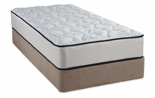 Twin size Mismatched Bedding mattress set with white floral polyester fabric mattress and beige foundation, affordable and practical for guest or dorm rooms.