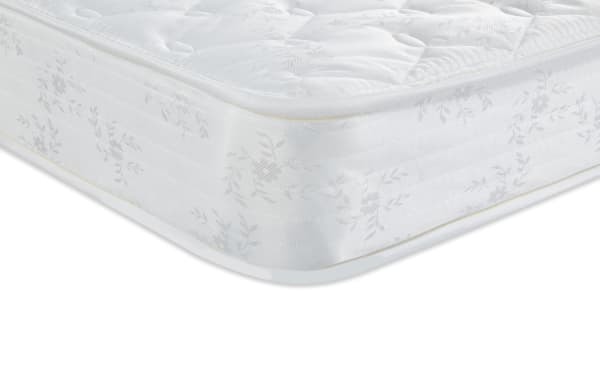 Perfection 6.5'' Full Firm Mattress with white floral-patterned quilted cover, innerspring support, and firm comfort level, ideal for budget-friendly quality sleep.
