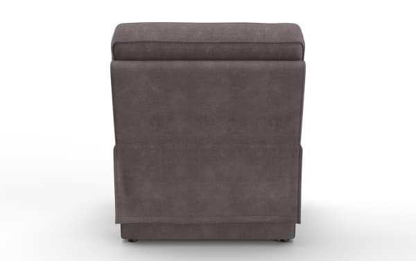 Upholstered armchair in dark gray fabric with a tailored skirted back design and rounded top cushion, suitable for modern living rooms.