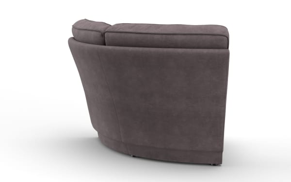 Curved sectional sofa corner piece in dark gray microfiber fabric with plush cushioning and modern stitching details.
