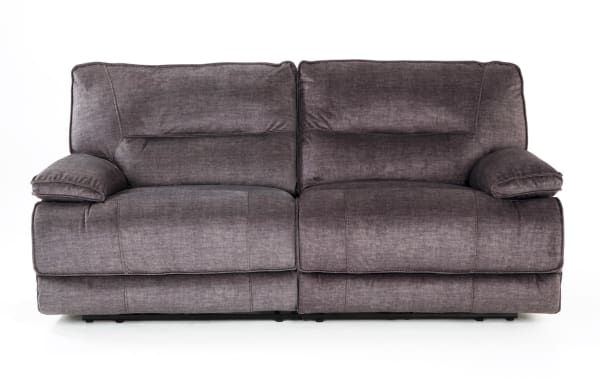 Pacifica Gray 82" power reclining loveseat in gray polyester fabric with plush cushions, transitional style, and built-in USB charging port.