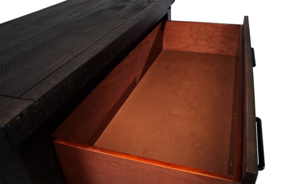 Open drawer of Montana Brown 5 Drawer Chest showing felt-lined interior in rustic brown pine veneer and MDF, part of Montana Bedroom collection.