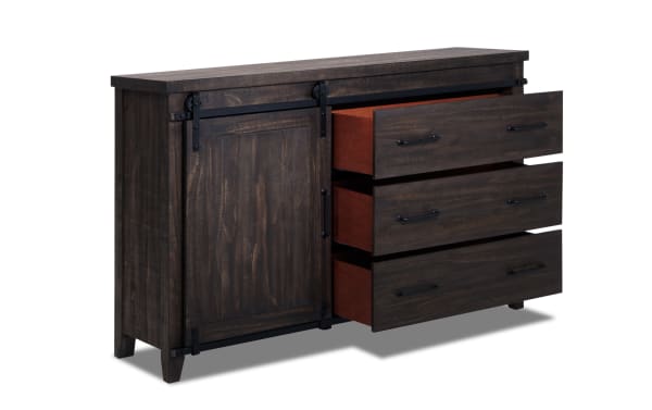 Montana Brown 5 Drawer Dresser in rustic dark brown finish, made of MDF, pine solids, and pine veneer, featuring sliding barn door, black metal handles, and soft-closing drawers from the Montana Bedroom collection.