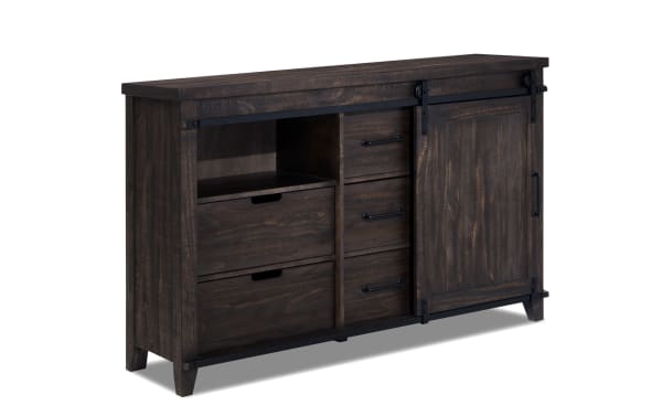 Montana Brown 5 Drawer Dresser in rustic dark brown MDF and pine solids with sliding barn door, soft-closing drawers, and metal handles.