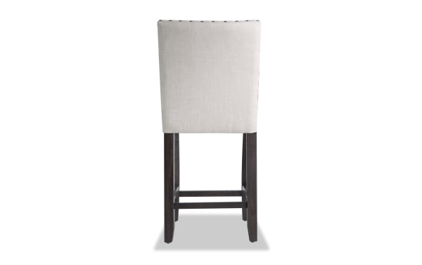 Beige Sonoma Espresso & Beige Solid Back Upholstered Counter Height Stool with polyester fabric, nailhead trim, and solid acacia wood legs in espresso finish.