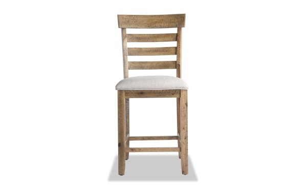 Sonoma Natural & Beige Ladder Back Upholstered Counter Height Stool with solid acacia frame, beige polyester fabric seat, and rustic transitional style.