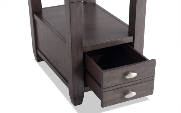 Prestige Gray Storage Chairside Table with transitional style, solid acacia wood, platinum finish, beveled tempered glass top, and two drawers with oval metal handles.