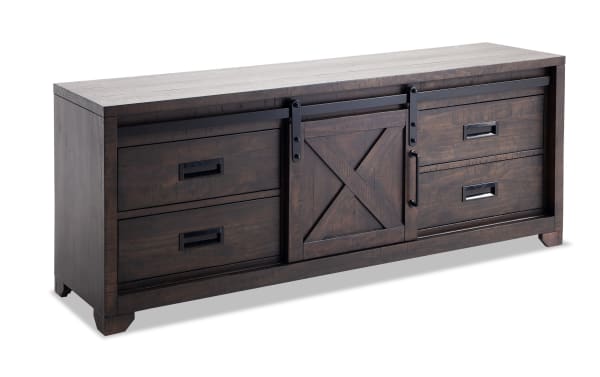 Montana 65'' brown rustic TV stand from Montana Entertainment & Occasional collection, made of pine solids, MDF, and pine veneer, with sliding barn door and four drawers for media storage.