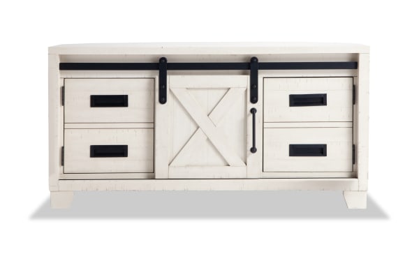 Montana 48'' white rustic TV stand with pine solids, MDF, pine veneer, sliding barn door, drawers, and shelves for media storage.