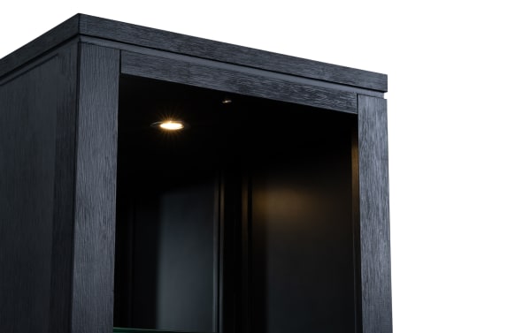 Elevations Black Universal Pier from Elevations Entertainment & Occasional collection, featuring black MDF and acacia veneers, glass shelves, recessed lighting, and a contemporary rustic design.