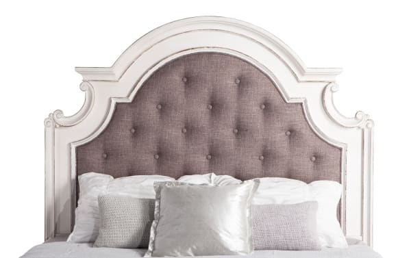 Queen-sized Scarlett upholstered bed with tufted gray polyester fabric, white distressed birch and oak frame, farmhouse style headboard.