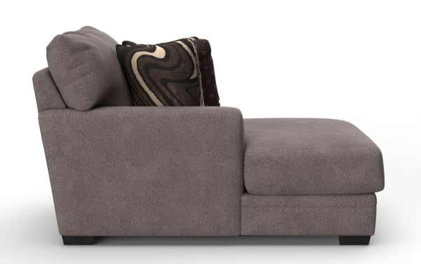 Modern gray fabric chaise lounge sofa with textured upholstery, cushioned armrest, and decorative patterned throw pillows, ideal for living rooms.