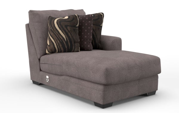 Modern chaise lounge upholstered in textured gray fabric with three decorative brown and beige patterned pillows, featuring a low armrest and black wooden legs.