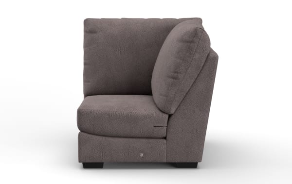 Modern gray fabric corner sofa section with plush cushions, textured upholstery, and low black feet, ideal for living room seating.