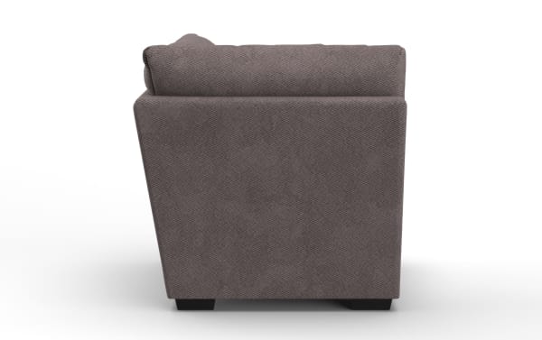 Gray fabric upholstered armchair side view showing textured material, cushioned backrest, and black wooden legs.