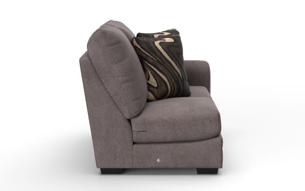 Gray fabric upholstered sofa with thick cushions and a decorative black and beige patterned throw pillow, shown from the side.