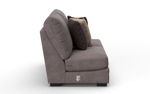 Modern gray fabric armless sofa with textured upholstery, thick cushions, and three decorative pillows in brown and beige tones, shown from the side.