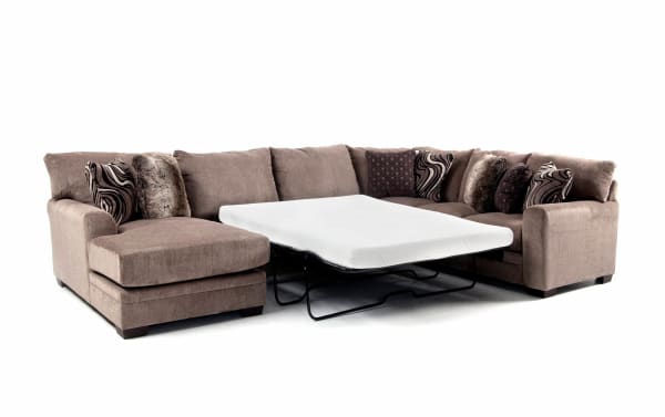 Luxe Gray 150" 4-piece left arm facing sleeper chaise sectional in gray polyester fabric with Bob-O-Pedic gel memory foam queen mattress, transitional style, and decorative accent pillows.