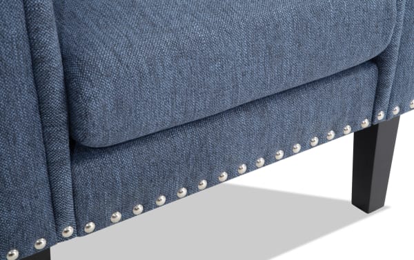 Scarlett Ocean Blue Accent Chair with blue polyester fabric upholstery, pleated back, silver nailhead trim, and black tapered wooden legs.