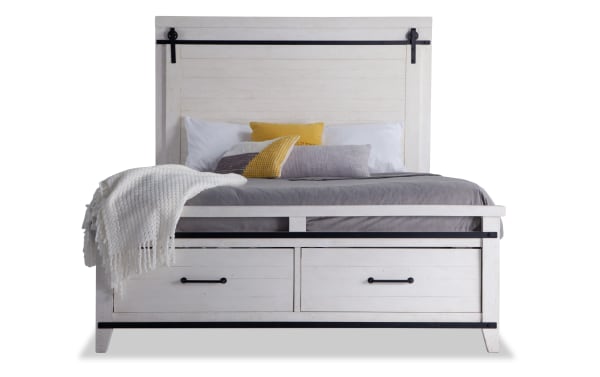 Montana Queen White Storage Platform Bed in rustic pine solids and veneer with two footboard drawers, black metal accents, and a high headboard.