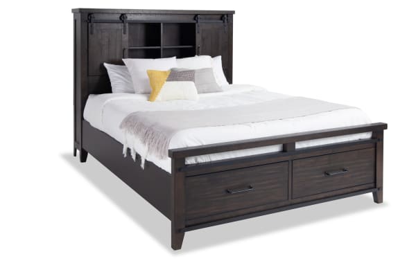 Montana Queen Brown Bookcase Storage Bed in rustic pine solids and veneer, featuring headboard cabinets, built-in power/USB ports, and footboard drawers.