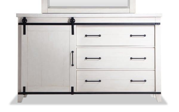 Montana White 5 Drawer Dresser with rustic white MDF, pine solids, and pine veneer, featuring black metal handles and sliding barn door hardware.