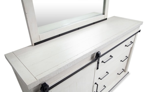 Montana White 5 Drawer Dresser & Mirror in rustic white finish, made of MDF, pine solids, and pine veneer, featuring soft-closing drawers and black metal sliding barn door hardware.