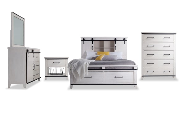 Montana 5 Piece Queen White Bookcase Storage Bedroom Set in rustic pine solids and veneer. Includes bookcase bed with storage drawers, cabinets, USB ports, nightstand with basket, dresser, and chest with soft-close, felt-lined drawers.