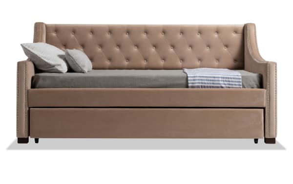 Chloe Twin Beige Upholstered Daybed with Twin Trundle in glam style, beige polyester fabric, tufted backrest, and nailhead trim, with pull-out guest bed.