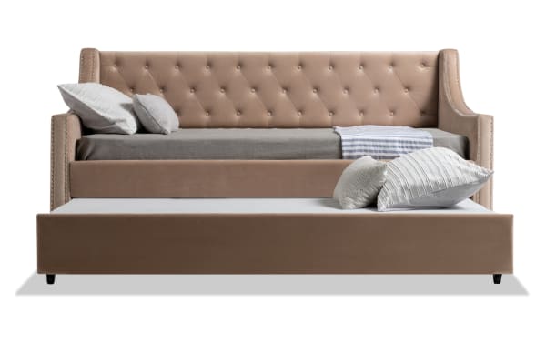 Chloe Twin Beige Upholstered Daybed with Twin Trundle in glam style, featuring beige polyester fabric, tufted backrest, and nailhead trim detailing.