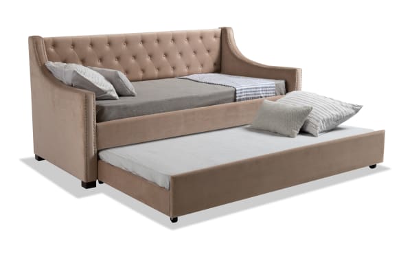 Chloe Twin Beige Upholstered Daybed with Twin Trundle in glam style, beige polyester fabric, tufted backrest, nailhead trim, and pull-out guest bed.