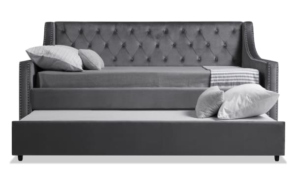 Chloe Full Gray Upholstered Daybed with Twin Trundle in gray polyester fabric, featuring tufted backrest, nailhead trim, and pull-out trundle bed for guest convenience.
