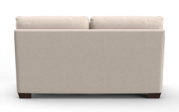 Beige fabric loveseat with clean lines, square arms, and dark wooden block legs, showcasing a modern, minimalist design.