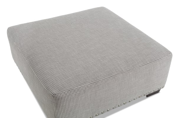 Cottage Chic Gray Ottoman with traditional style, gray polyester fabric upholstery, nailhead trim, and memory foam cushion for comfortable seating.